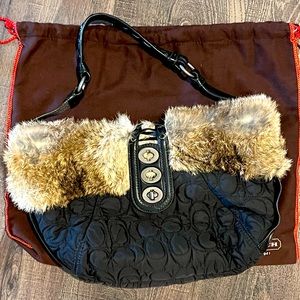 Coach handbag with rabbit fur and embossed c.  Used 1 time. Has original duster